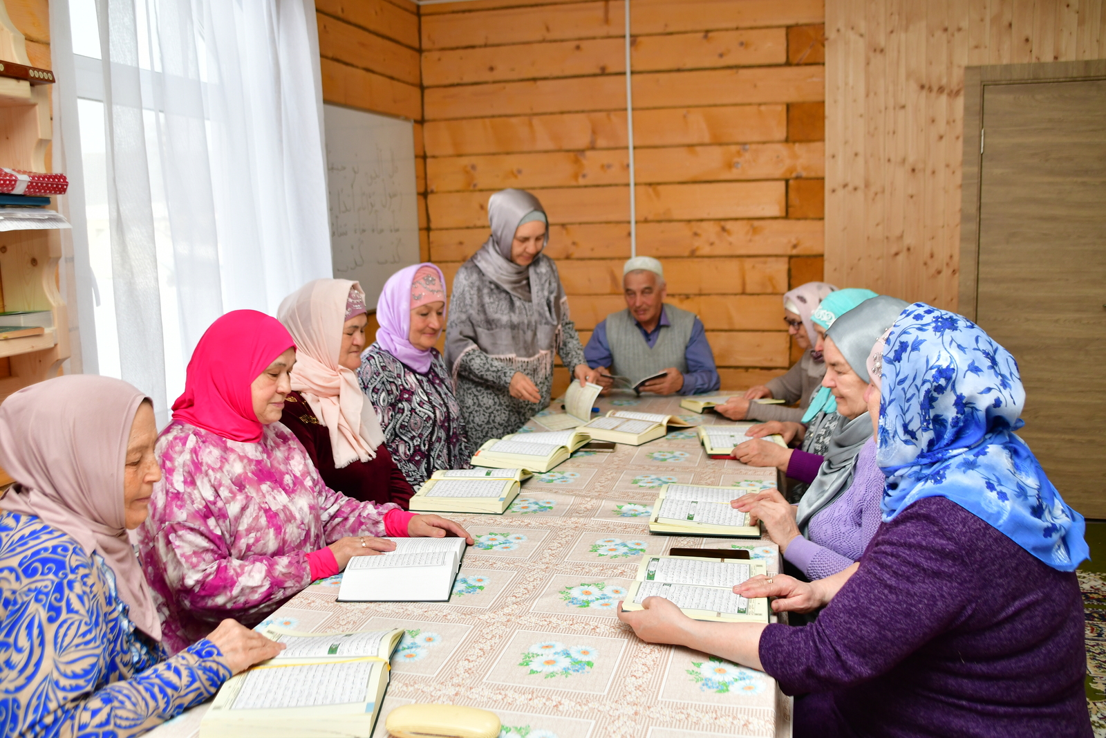 Коран читают в оригинале